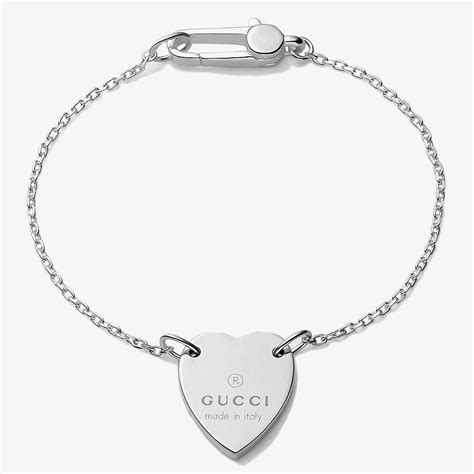 bracelet with gucci trademark heart on wrist|Gucci trademark heart silver bracelet.